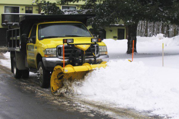 Condo Snow plowing services by Custom Exterior Landscape