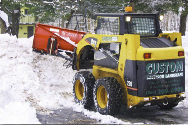 commercial Snow removal services by Custom Exterior Landscape