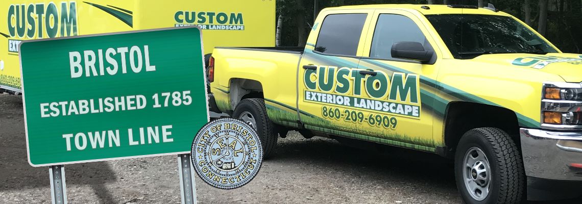 Custom Exterior Landscape Truck and Trailer with the welcome to the City of Bristol sign and the Bristol CT seal