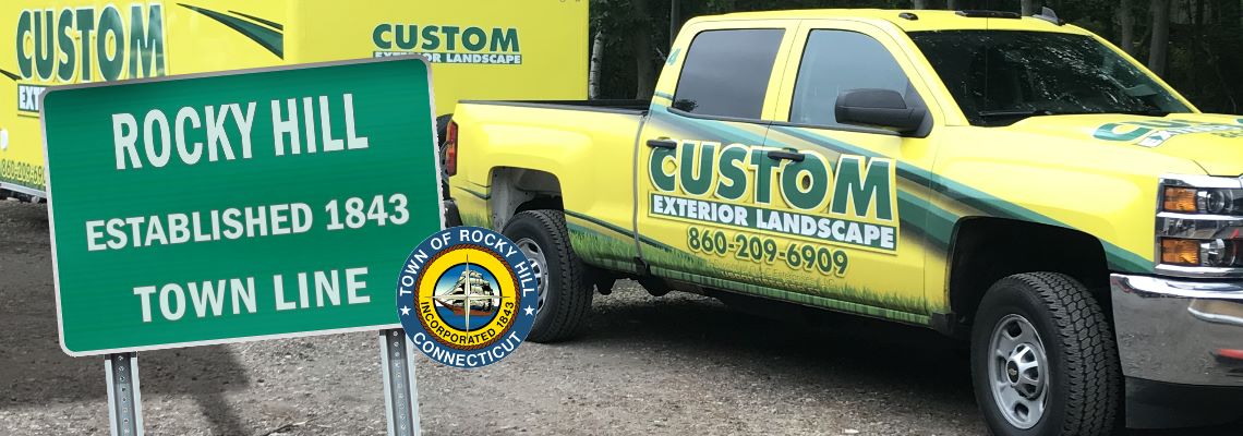 Custom Exterior Landscape Truck and Trailer with the welcome to Rocky Hill sign and the Rocky Hill CT seal